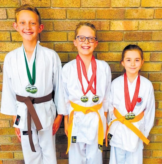 Karatekas perform at JKA tournament