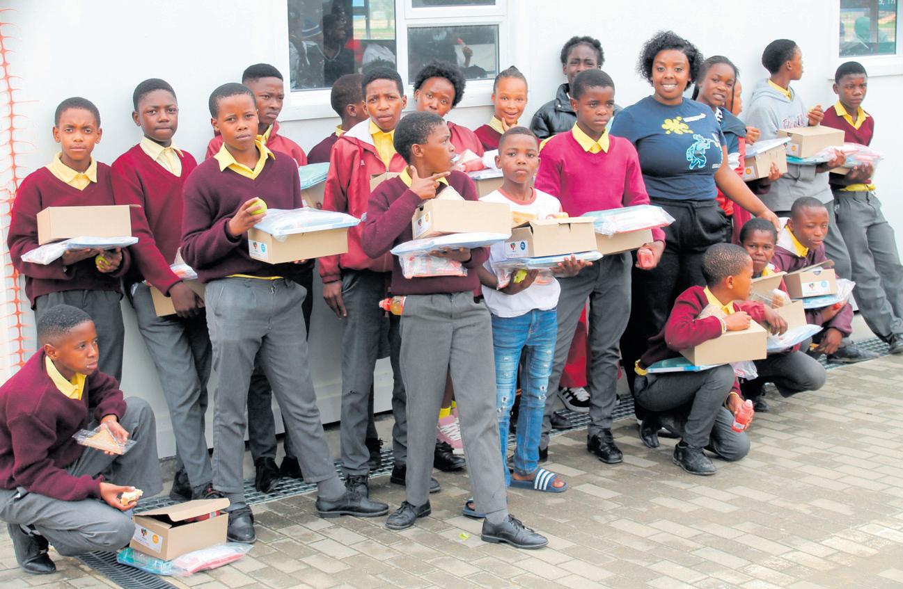 School shoe donations put a skip in learners' steps