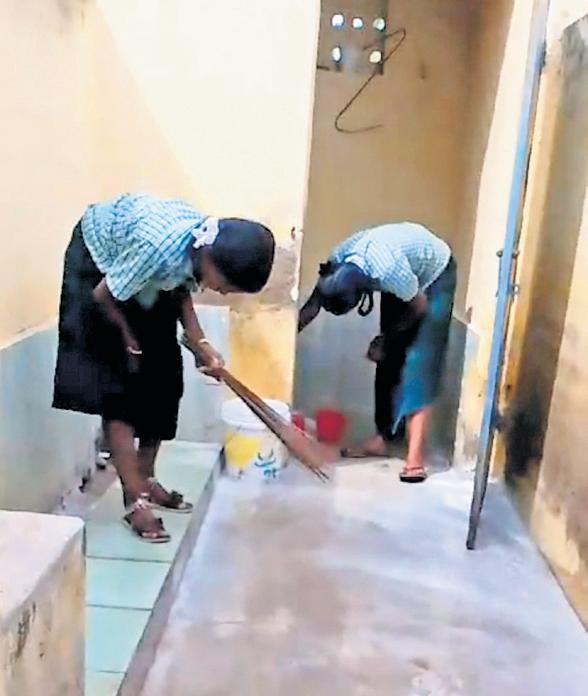 Govt school HM suspended after video of two girl students cleaning toilet goes viral