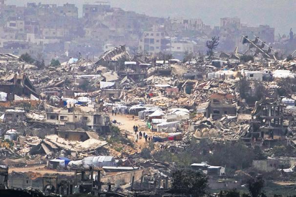 Israel pushes deep into Gaza as court halts Shin Bet chief firing