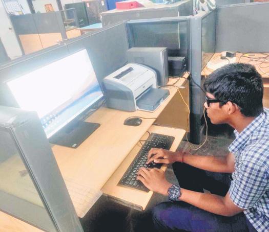 1st Blind Student to Write Test on PC Aces +2 Exam