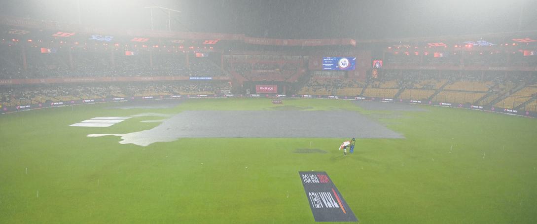 Dancing in rain with Kohli name on back in B'luru