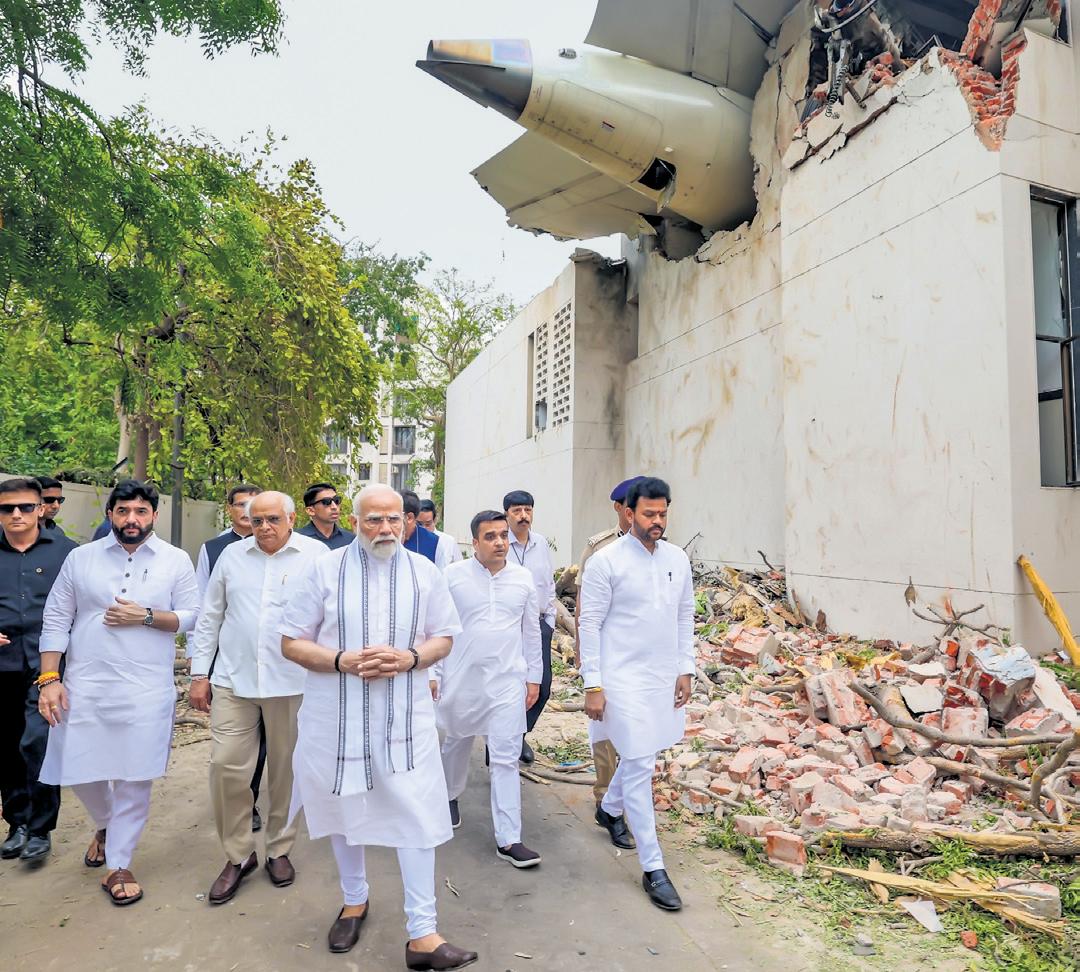 Black box found, Modi visits crash site