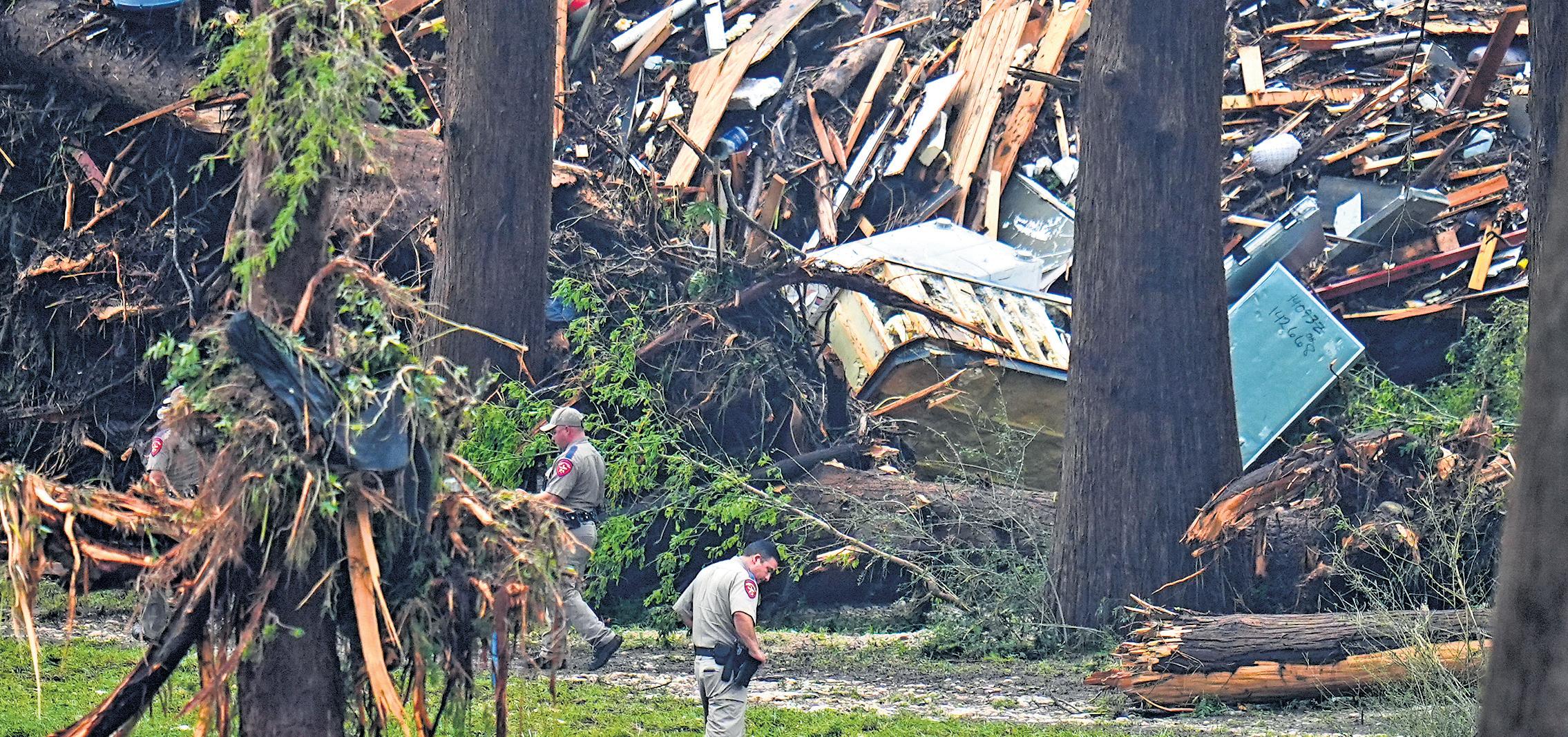 Death toll in Texas floods rises to 67 as 11 campers remain missing