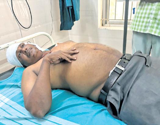 Questioned for late arrival, 'drunk' students attack teacher with liquor bottle