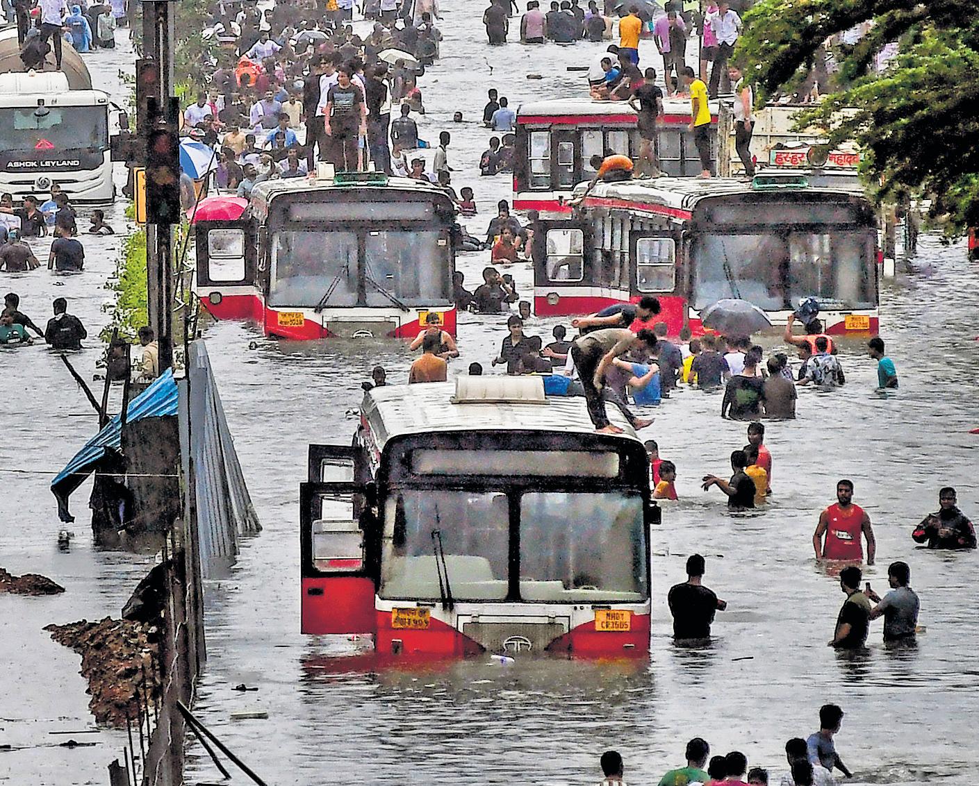 Rains bring Mumbai to its knees; rail traffic, road network crippled