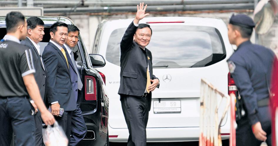 Thai court acquits former PM of royal insult charge