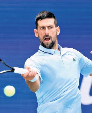 Record-chasing Djokovic in Round 3