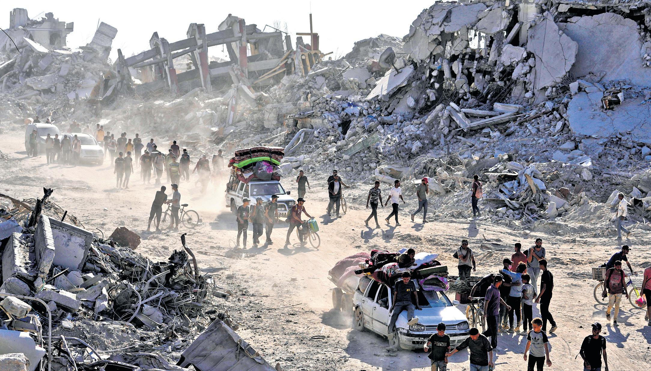 Gaza residents return amid truce as aid groups scale up to expand relief
