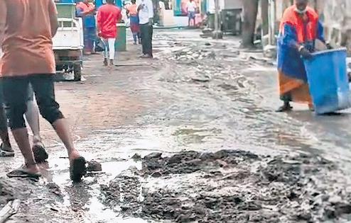 Pattalam residents want corpn workers to clear leftover sludge