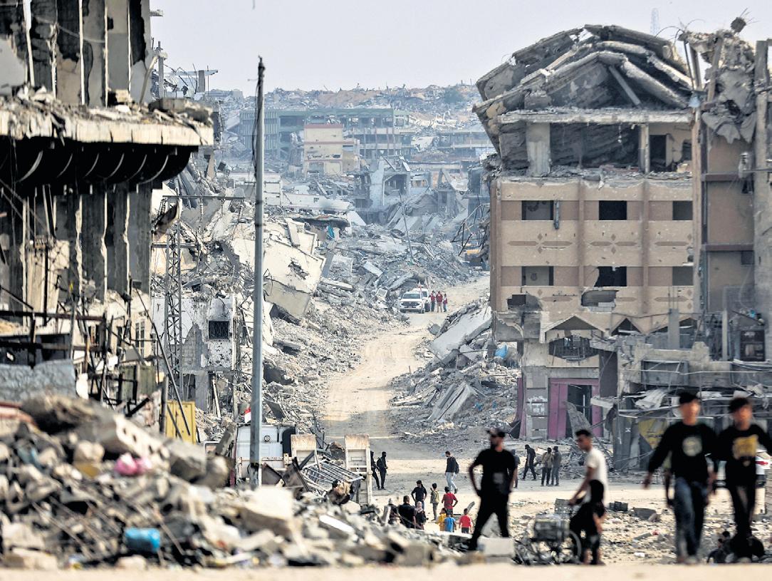 Israel hands over 45 Palestinian bodies as truce holds