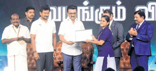 CM gives laptops, exhorts students to rule world