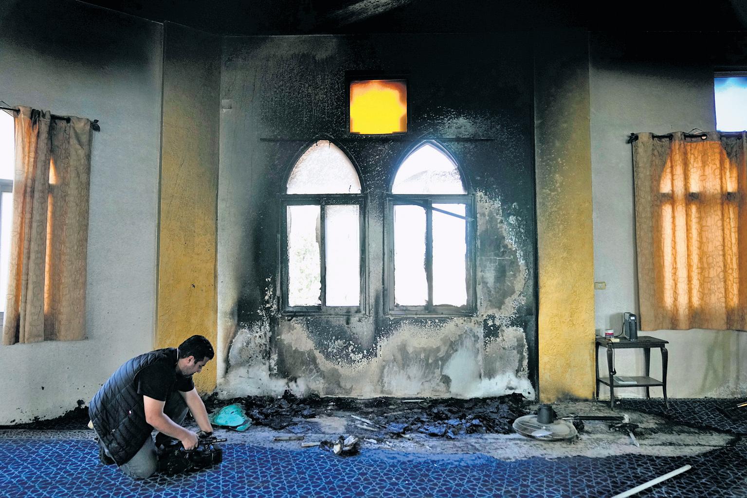 Israeli settlers torch, deface West Bank mosque in defiant escalation of violence