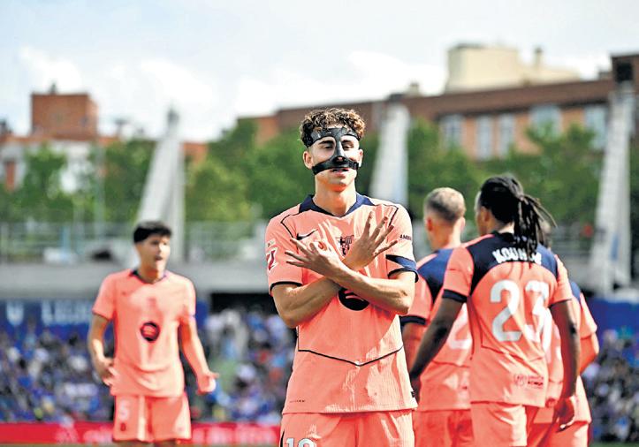 Barcelona beat Getafe 2-0, get one step closer to La Liga title