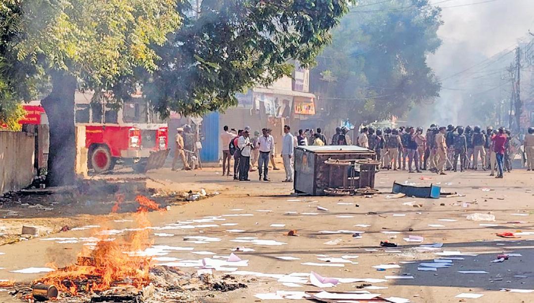 Constitution at Ambedkar statue vandalised, Maha violence erupts