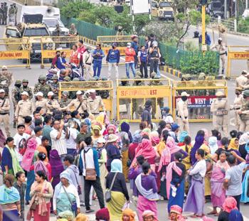 Protesters clash with police in Manipur
