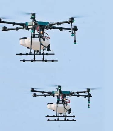 Co-op societies using drone sprayers for yields