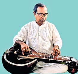 School headmaster develops 22-string modified guitar for classical music need