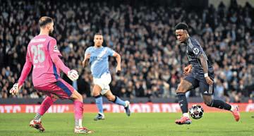 PSG, Real Madrid & Arsenal march into Champions League last eight