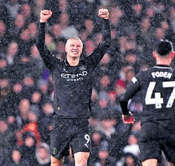 Record-breaking Haaland helps City win in thriller