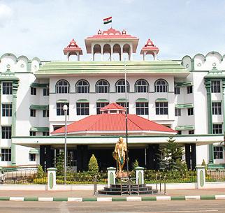 கள்ளழகர் கோயில் உபரி நிதியில் வணிக வளாகம் கட்ட இடைக்கால தடை