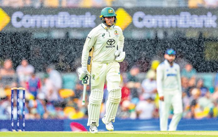 Wet & watch at Gabba as rain takes centre stage