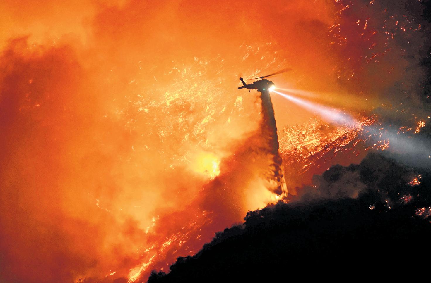 RETURN OF STRONG WINDS MAY PUSH BLAZE TOWARDS LANDMARKS IN L.A.