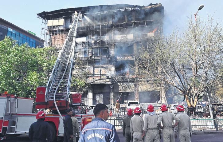 Vehicles gutted in shopping complex fire