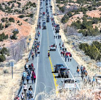 Pilgrims trek desert to historic New Mexico church