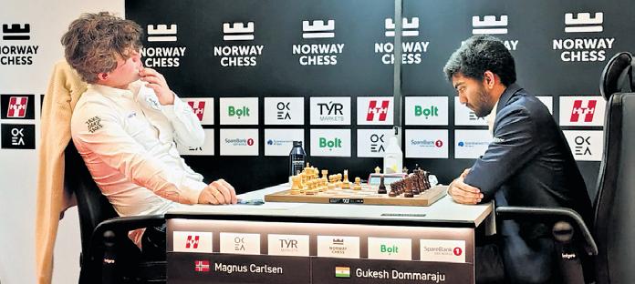 Carlsen, Gukesh in high-wire contest