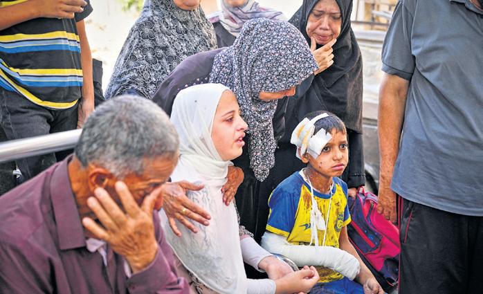Israel forces, drones kill 44 waiting for aid as toll tops 56,000 in Gaza
