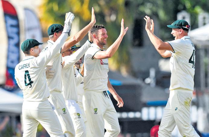 Australia Clinch First Test as Windies Batting Collapses