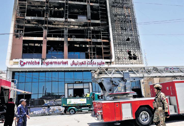 Fire at newly opened shopping mall in eastern Iraq kills over 60 people