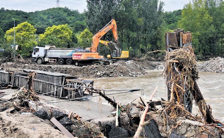 Heavy rains and flooding kill 34 people near Beijing