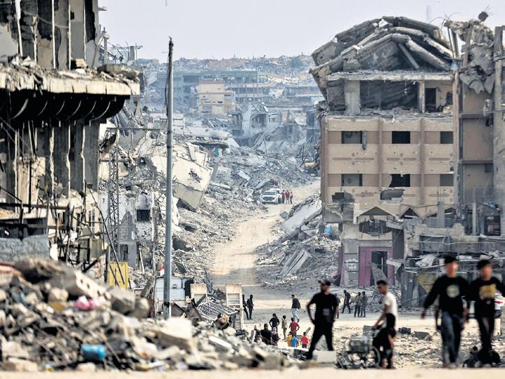 Israel hands over 45 Palestinian bodies as truce holds