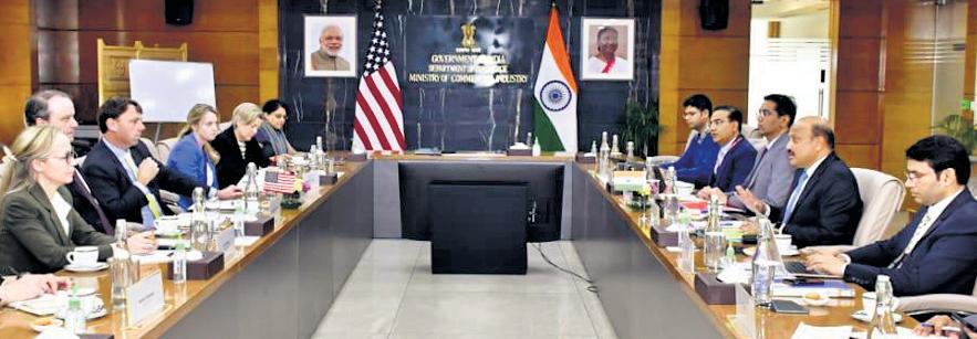 US gives mixed signals as trade talks resume