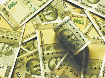 Rupee falls below 91 as RBI stops intervention