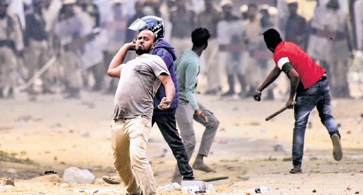2 killed, 38 cops hurt as violence spirals in Assam