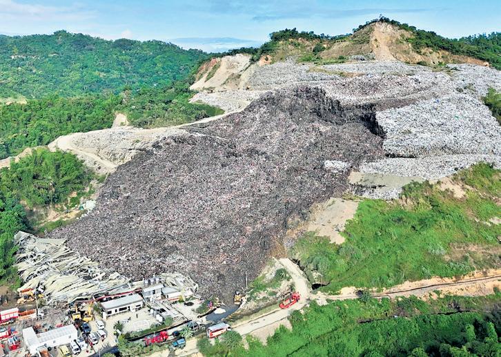 36 missing as Philippine landfill garbage, debris avalanche kills two, traps dozens