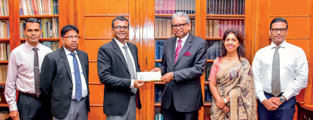 National Savings Bank hands over Rs.6bn dividend to Treasury