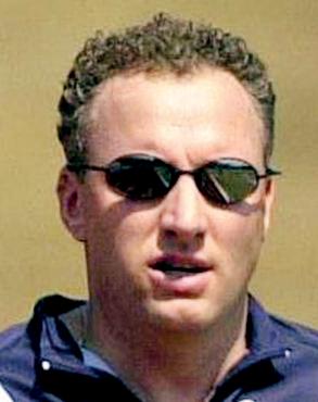 Coach pleads not guilty