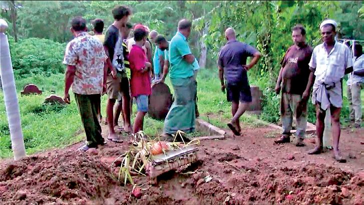 Twin grave dug up for devil-dancing rite to 'cure' possessed woman