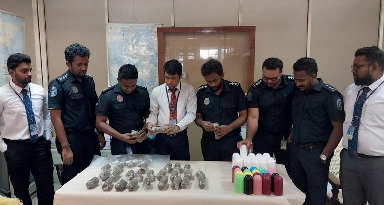 குடைக்குள் 'குஷ்'ஷடன் வந்த தொழிலதிபர் கைது