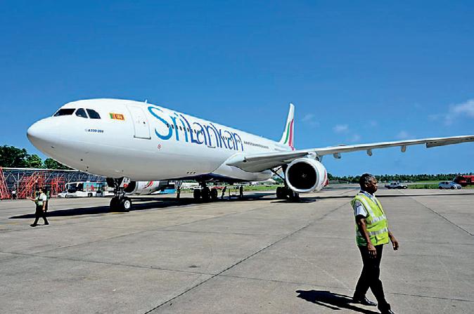 SriLankan Airlines' first wide-body aircraft in seven years touches down at BIA