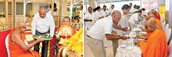 People's Bank holds religious programs to mark 64th anniversary