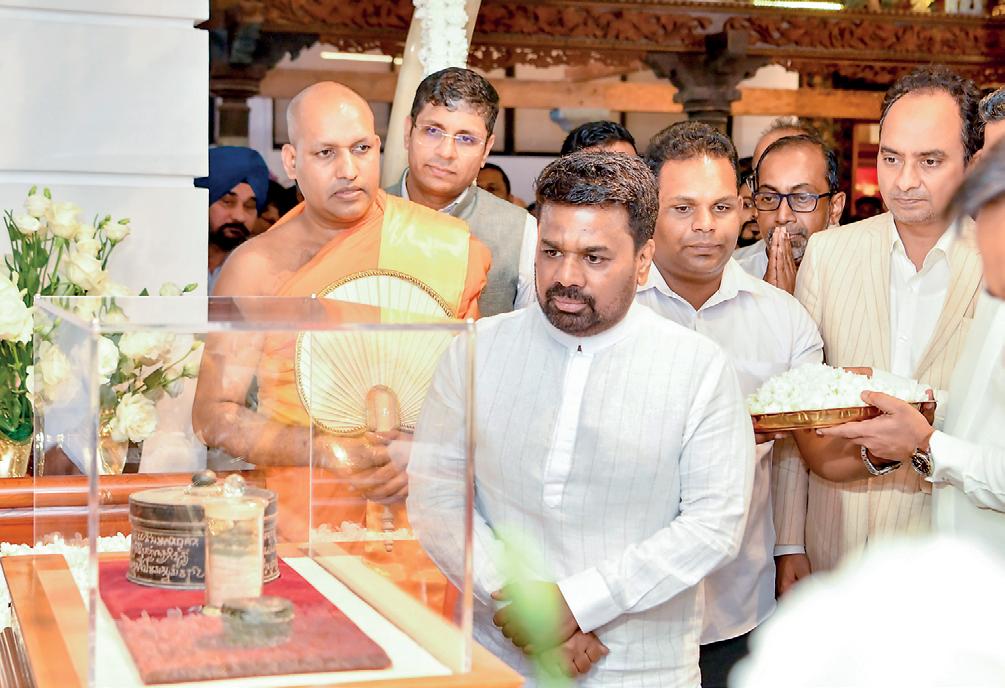 President pays homage to Sacred Devnimori Relics of Lord Buddha