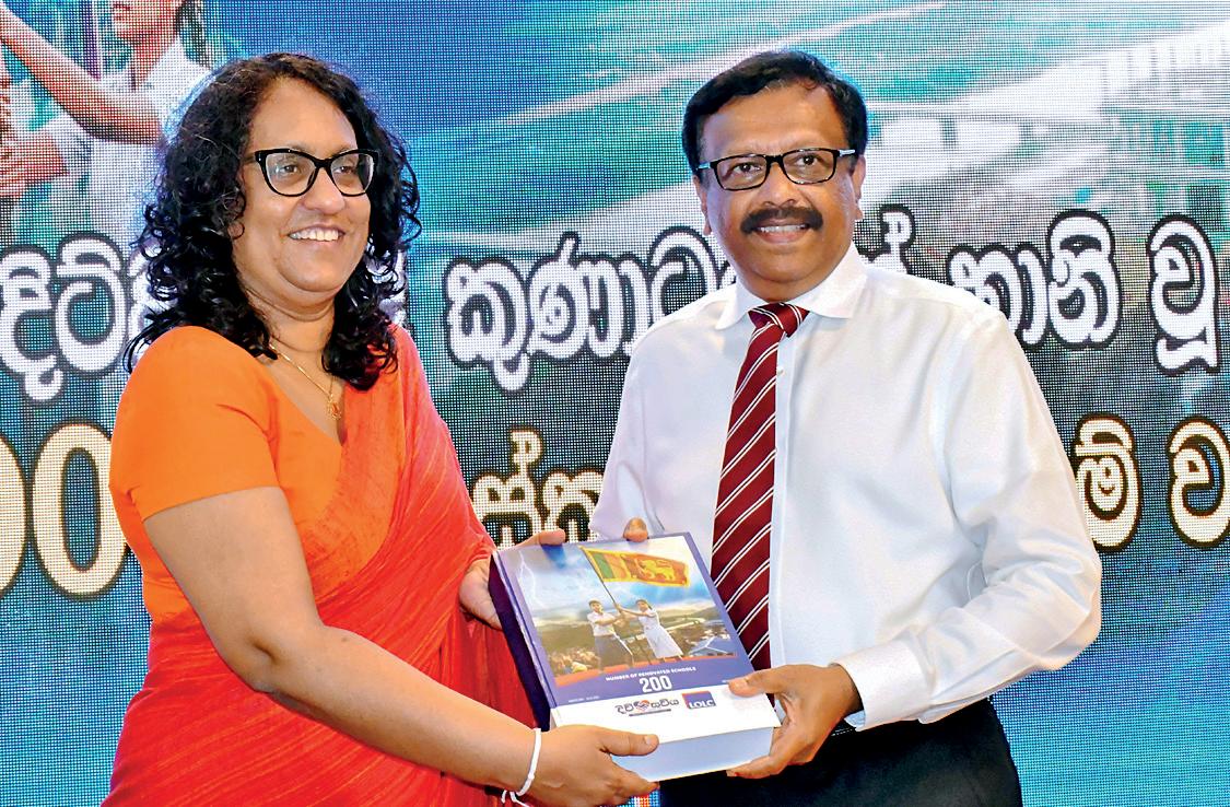 Education Ministry recognises LOLC Divi Saviya “Obai Mamai Ape Ratai” for restoring 200 schools under 45 days
