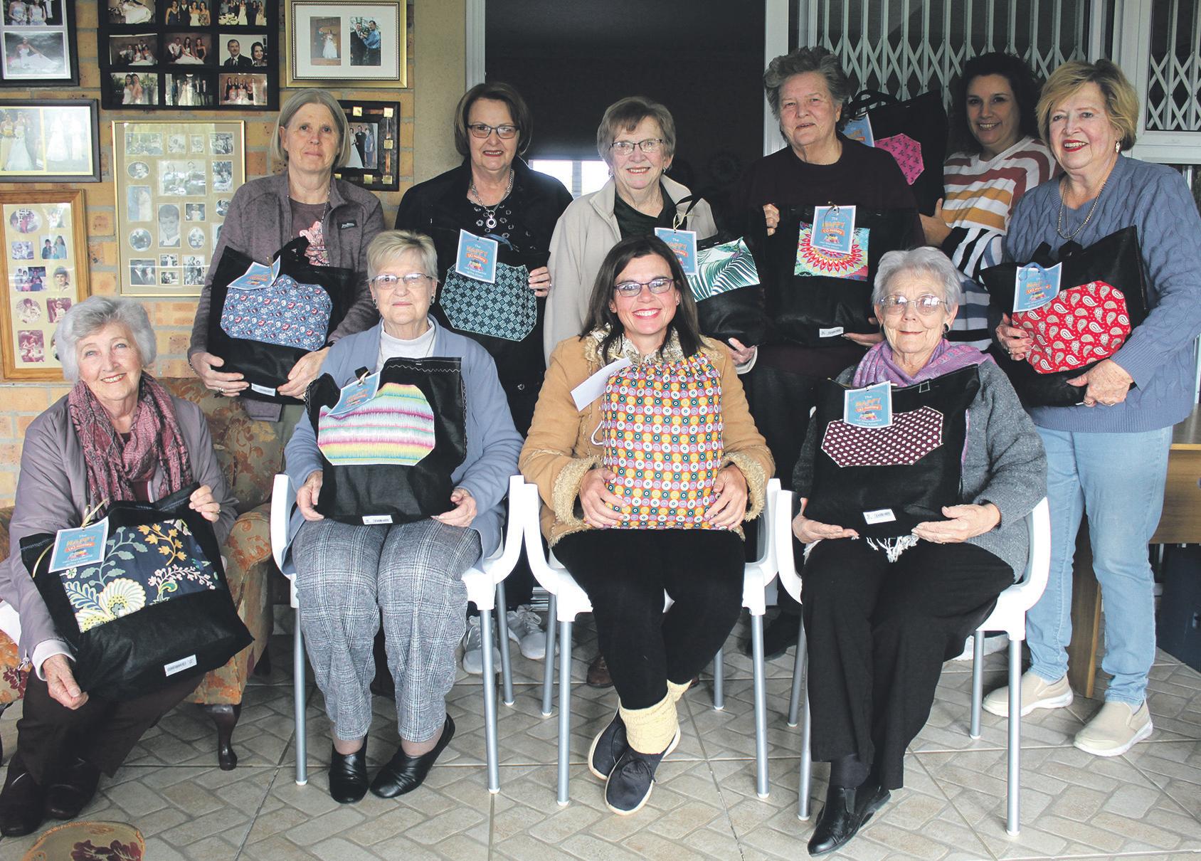Happy (K)nutters knit blankets for Mandela Day