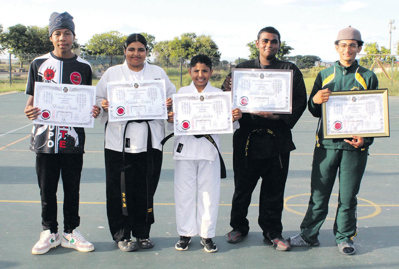 TSKKIA seniors earn black belts