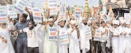 Minority community members protest in Kol against Waqf Bill